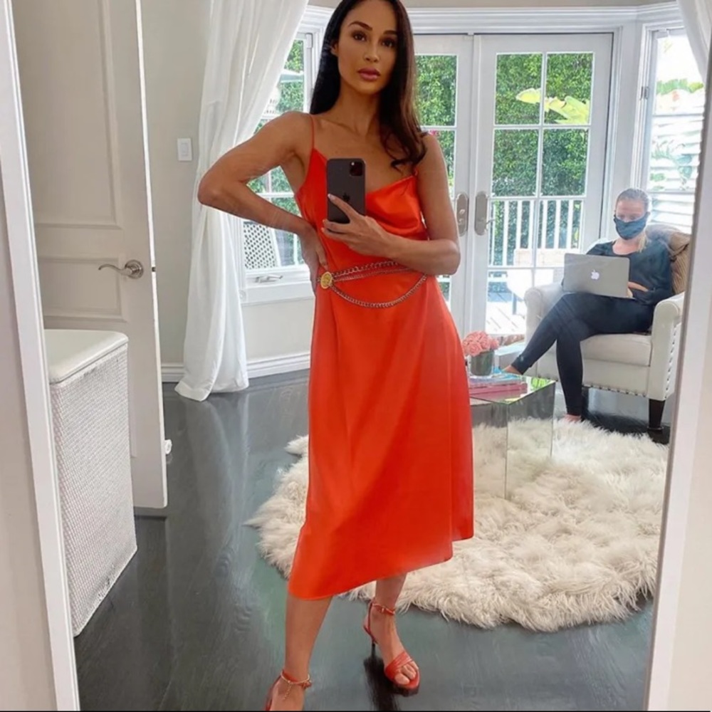 Cara Santana orange satin dress